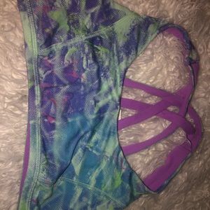 Purple and green reversible sports bra